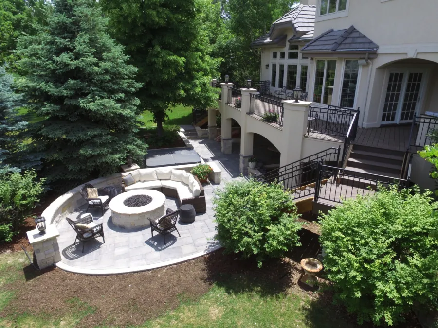 Custom Decks timbertech english walnut decking large paver patio stone bench fire pit greenwood village colorado