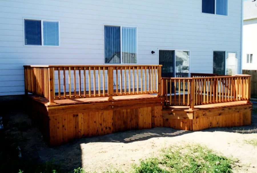Custom Decks redwood deck solid skirting standard snowpush railing Centennial Colorado